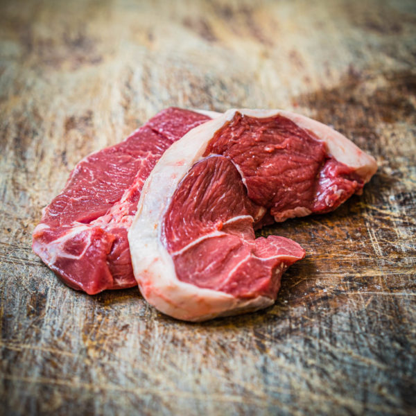 Organic home bred lamb leg steaks